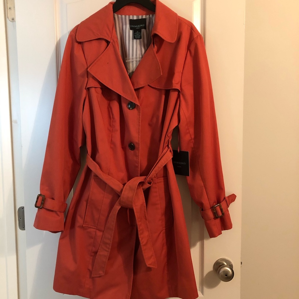 Trench coat. Length 37”. New
